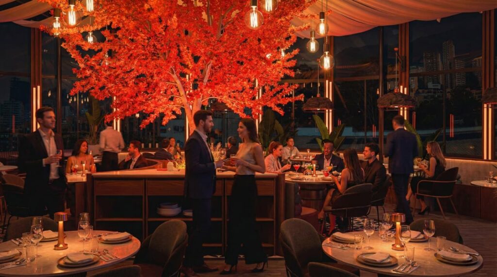 Astoria Rooftop — salón principal con árbol naranja