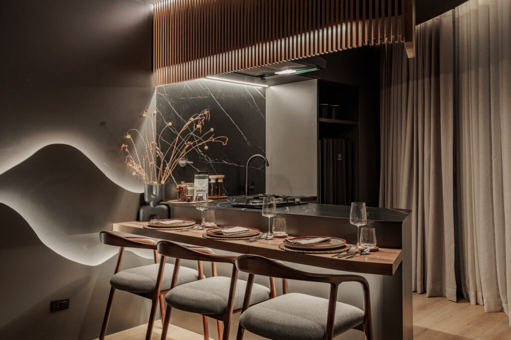 Suite Deluxe — cocina barra de mármol negro
